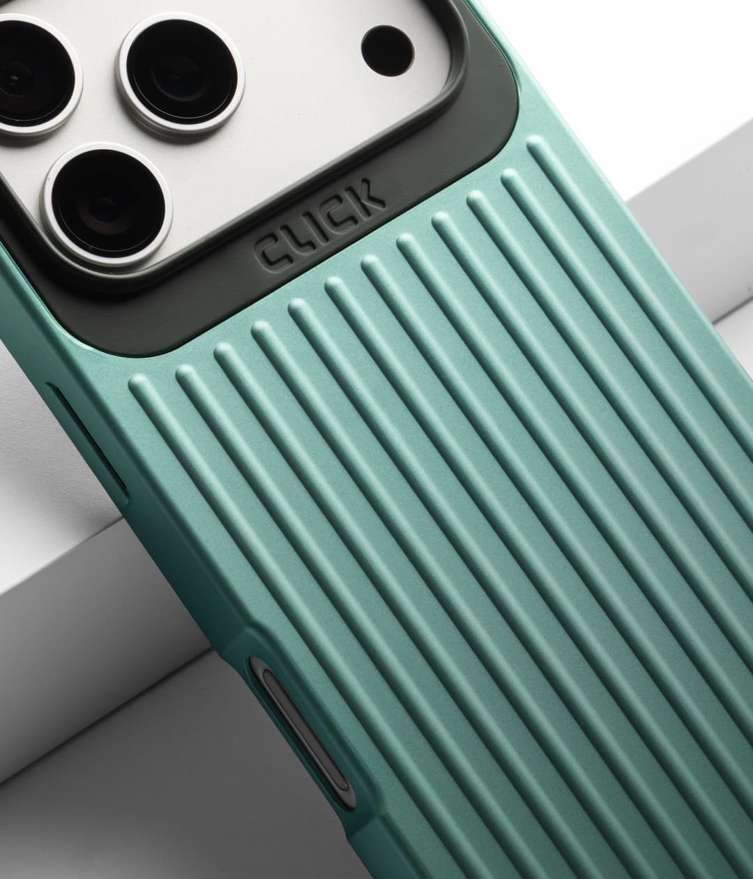 CLICK Nova phone case, macro shot of the ribbed side rail and camera cutout with the embossed CLICK logo